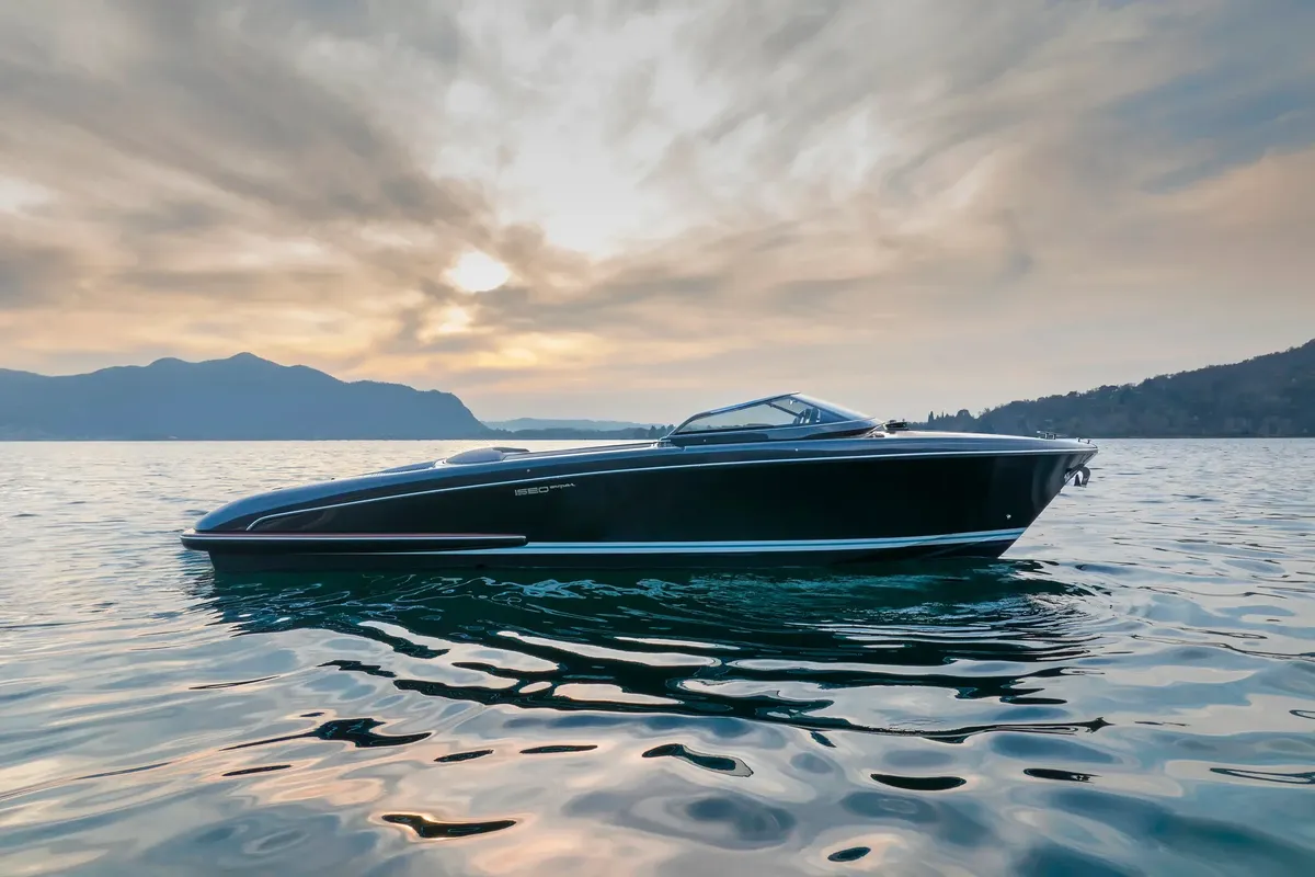 Riva Iseo Super: Boat on calm water at sunset