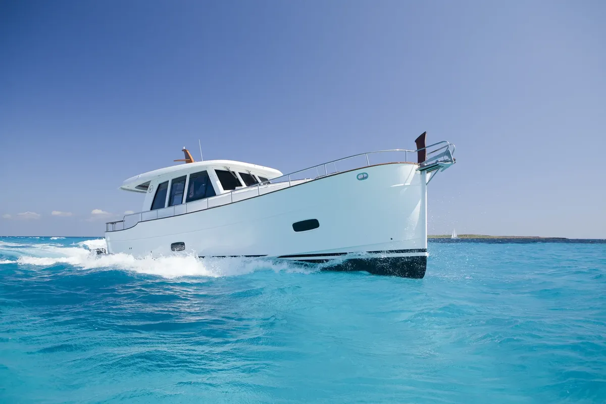 Sasga Yachts Menorquin 42 HT: White boat cruising at sea