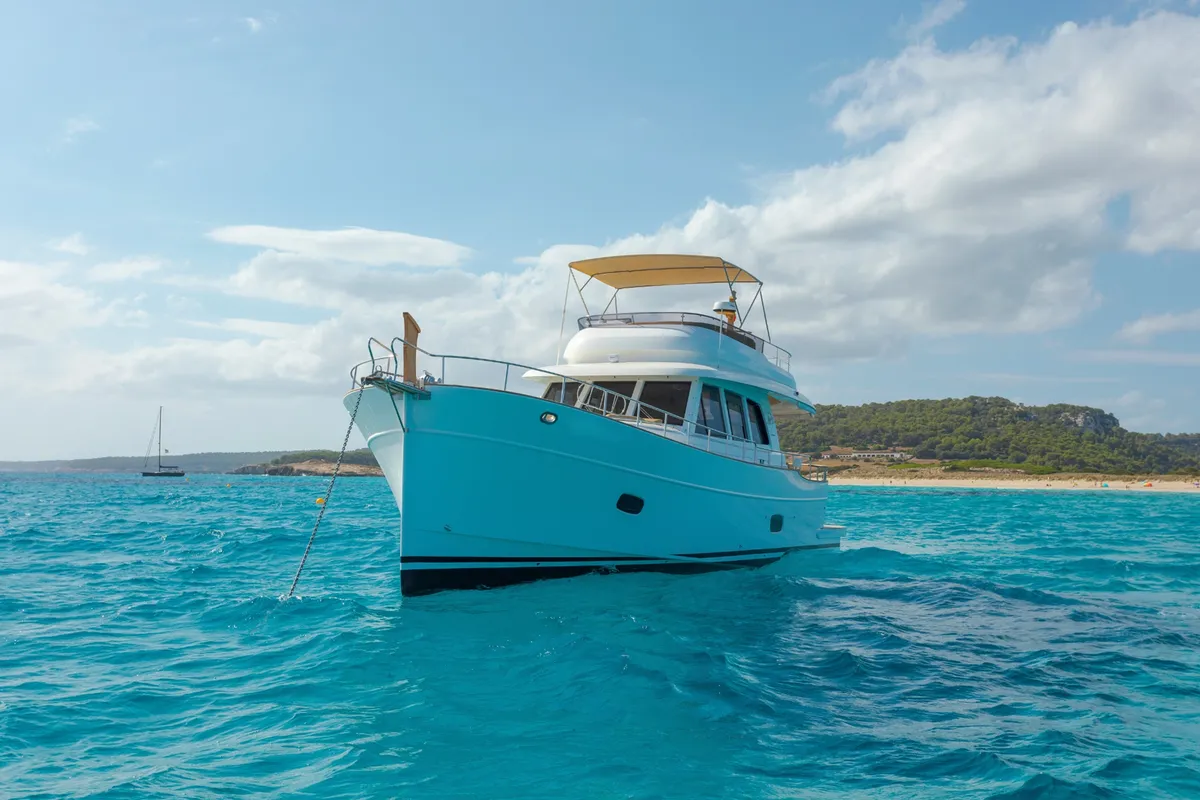Sasga Yachts Menorquin 55 FB: Boat at anchor off the coast