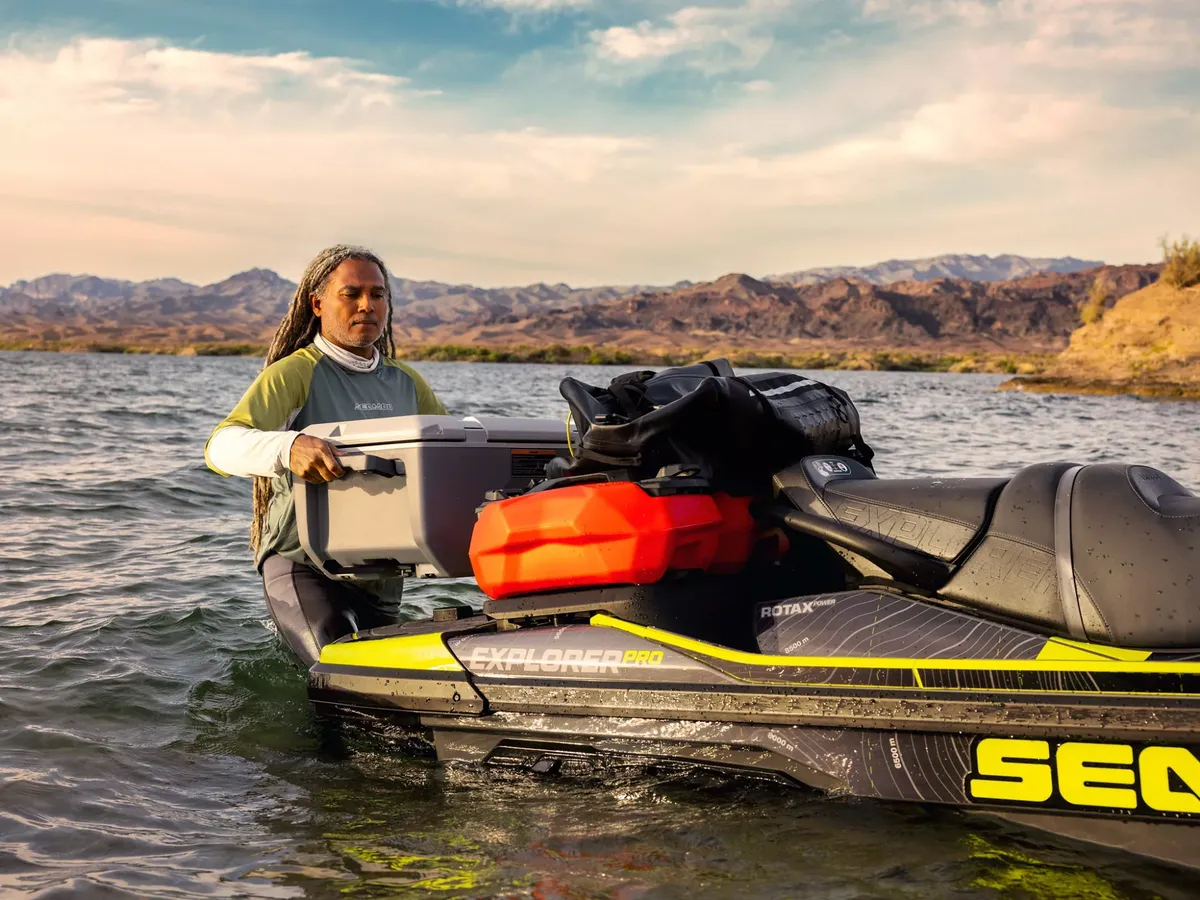 Sea-Doo Explorer Pro: Man unloading jet ski equipment