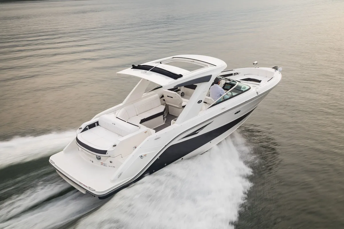 Sea Ray SLX 310: Boat cruising on water