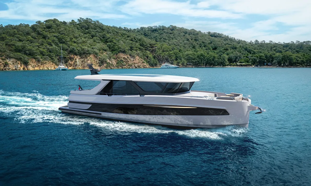 Steeler Yachts Enigma 59: White motor yacht cruising at sea