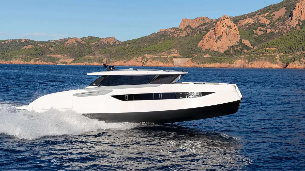 Sunreef Yachts 55 Ultima: White boat cruising fast across the sea