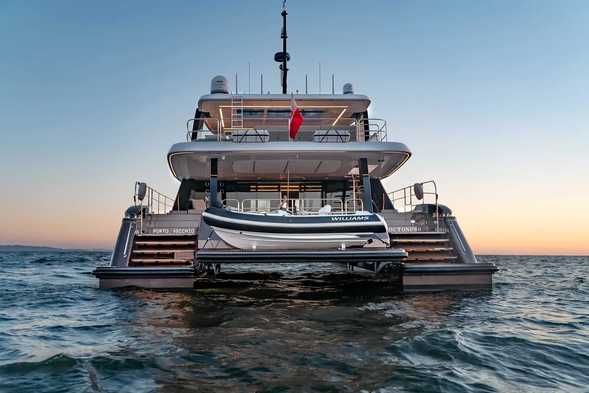 Sunreef Yachts 60 Power: Rear view of a catamaran with tender