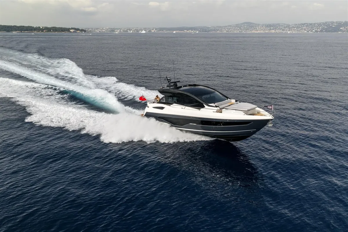 Sunseeker Predator 55: Boat cruising with a high bow wave