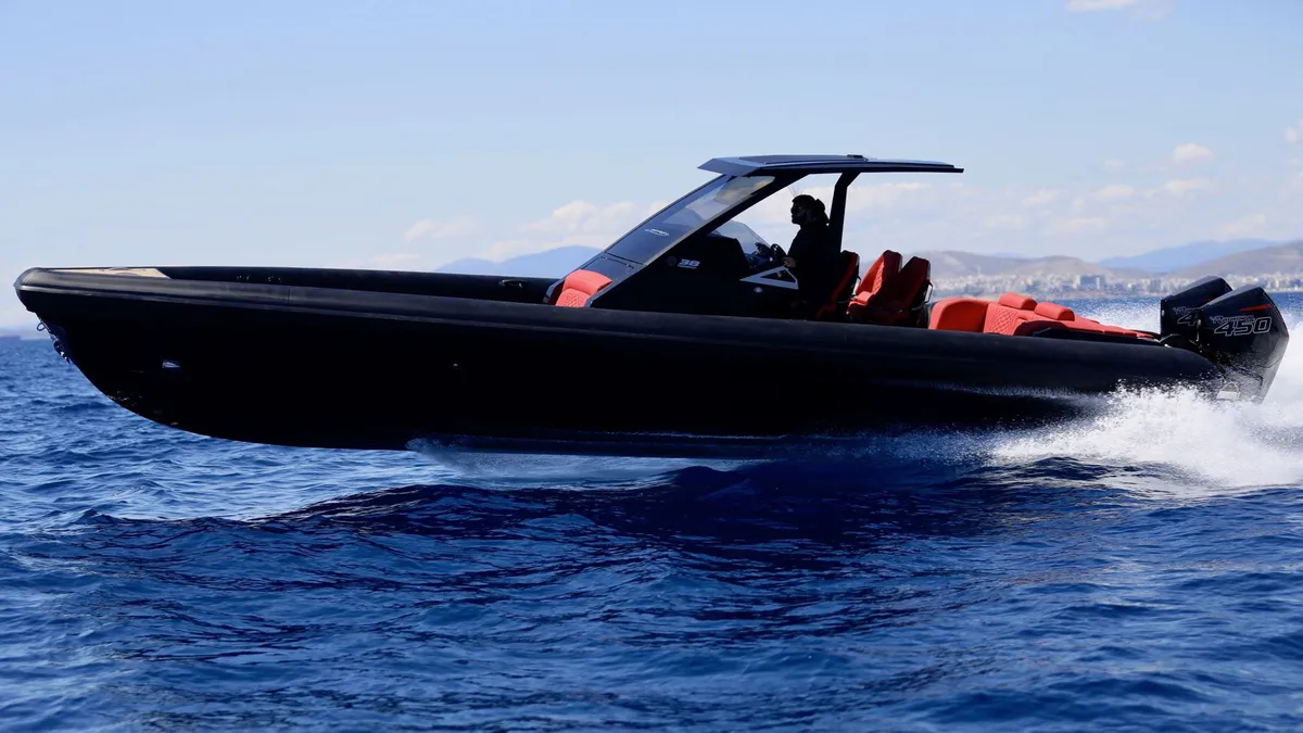 Technohull 38 Grand Sport: Black speedboat cruising at sea