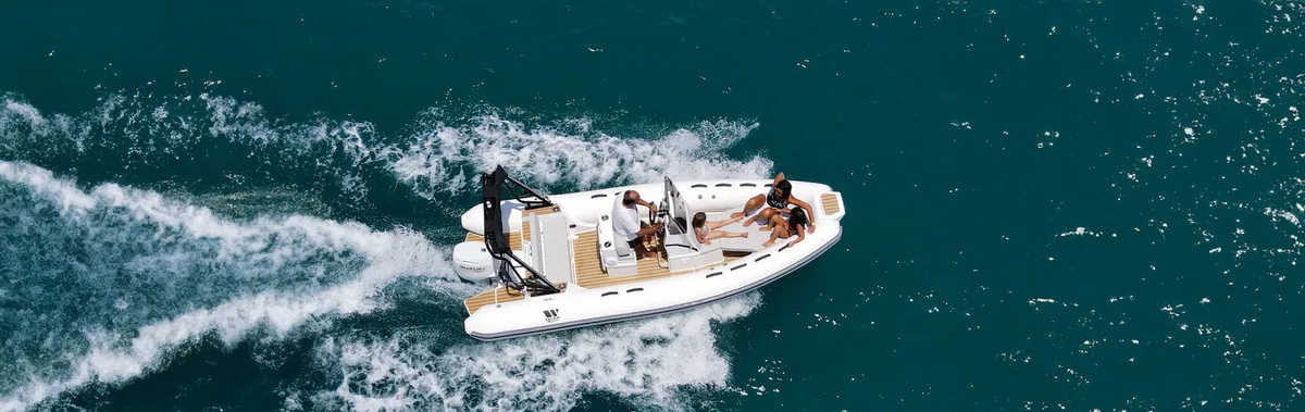 Tiger Marine 550 ProLine: Boat cruising through waves