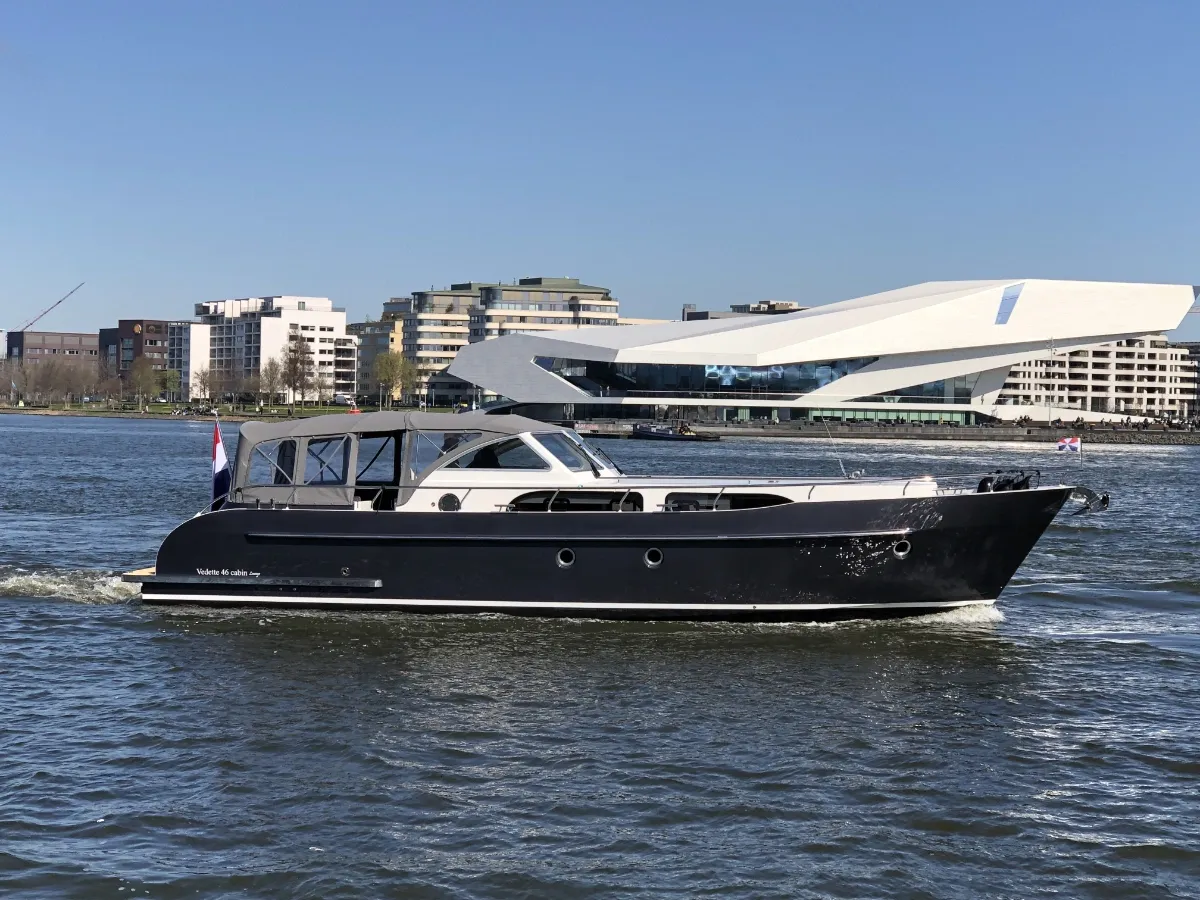 Vedette 36 Cabin Lounge: A lounge speedboat sailing past the Eye Film Museum