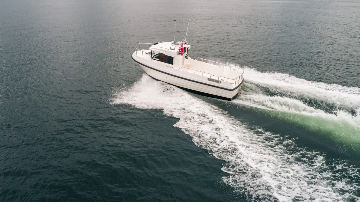 Viknes 8: Boat cruising at sea