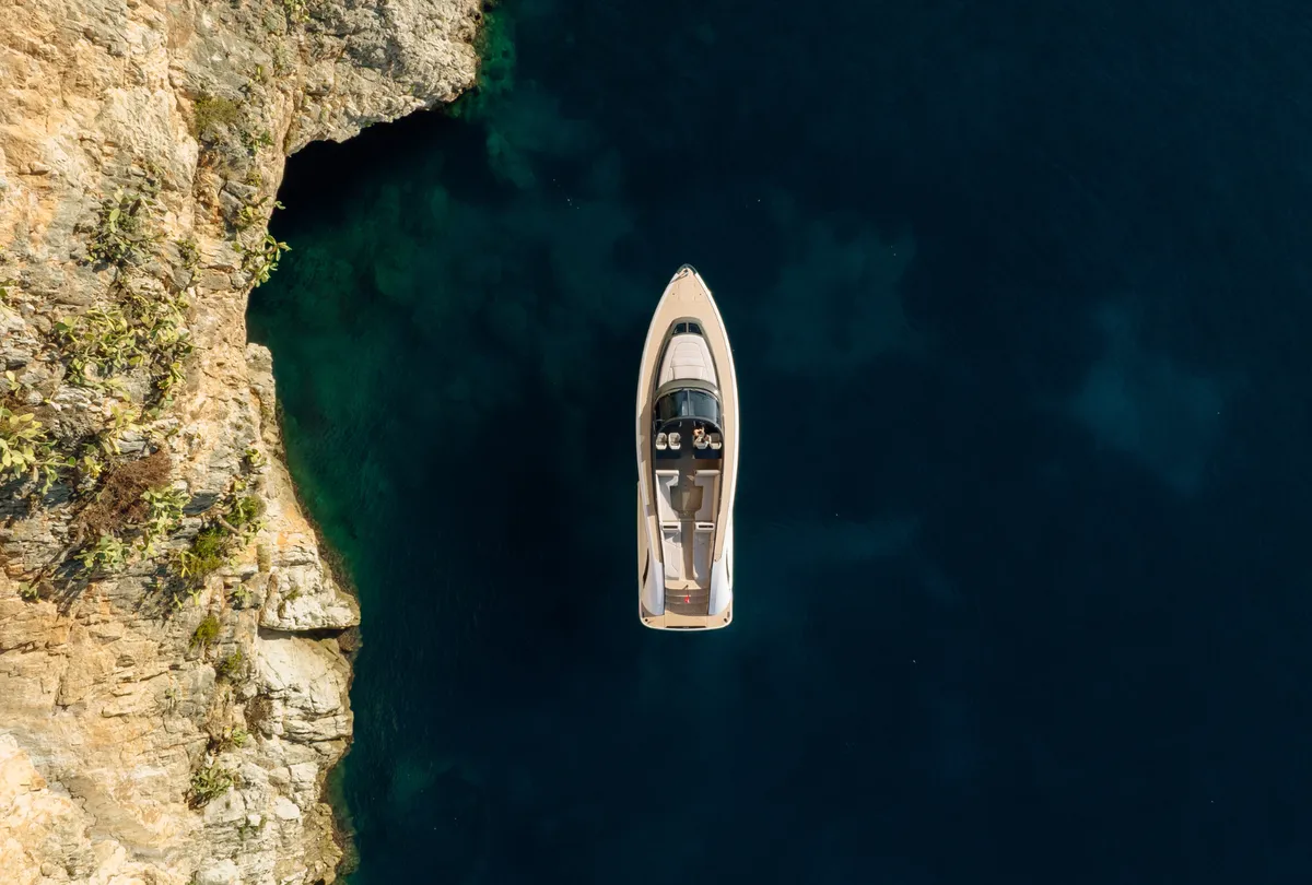 Wajer Yachts 55: Boat off a rocky coast