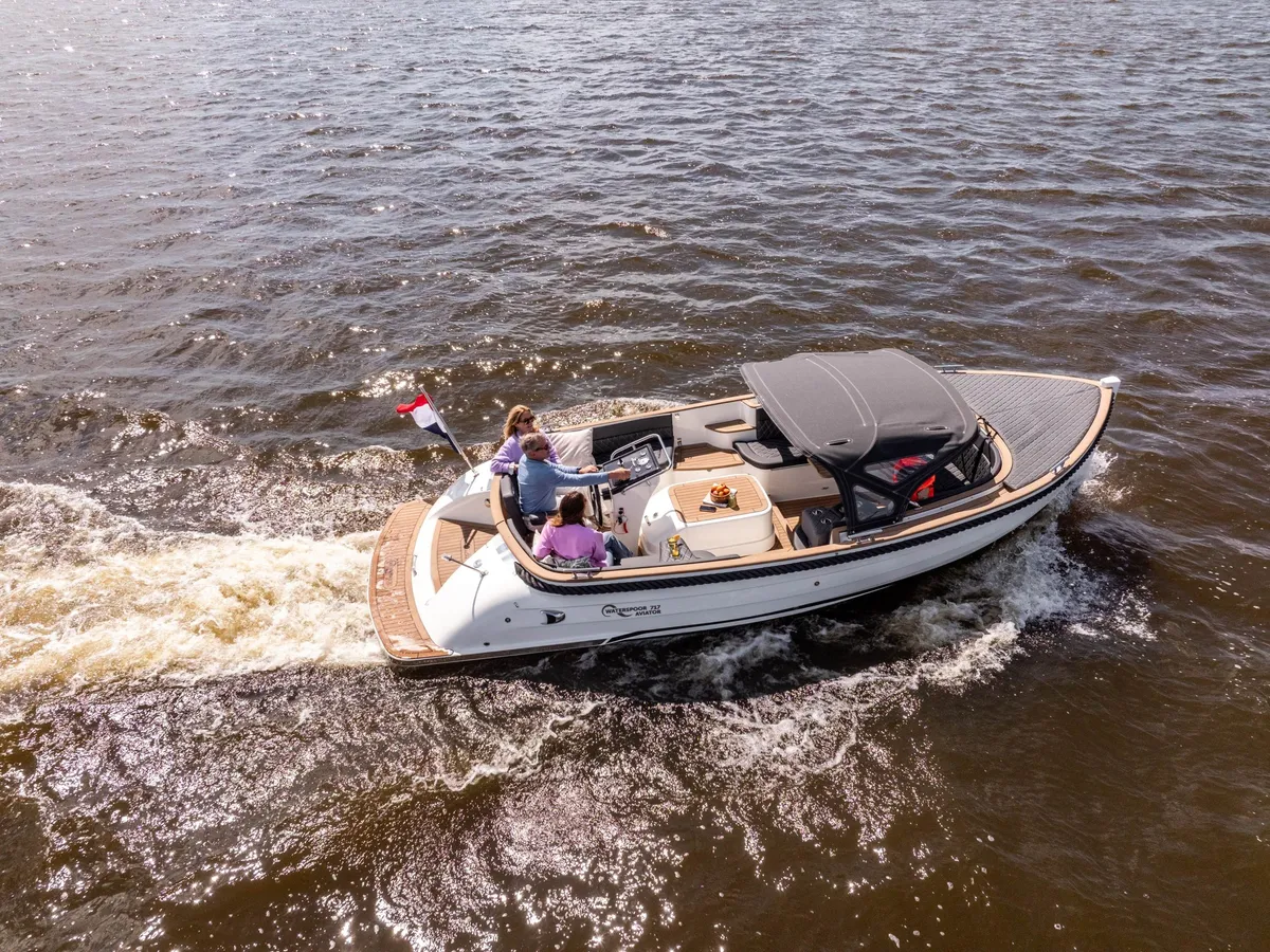 Waterspoor 717 Aviator: Boat cruising on water with passengers