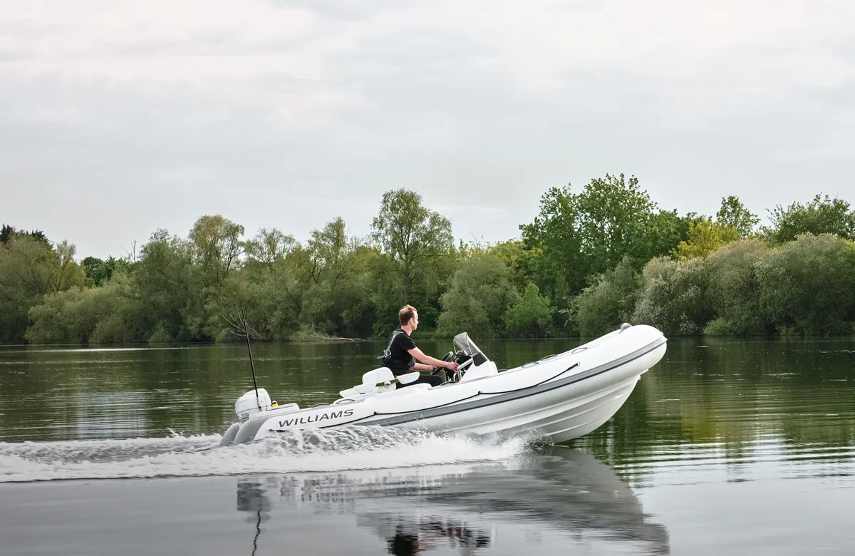 Williams Jet Tenders SOLAS 505: Boat cruising on a lake