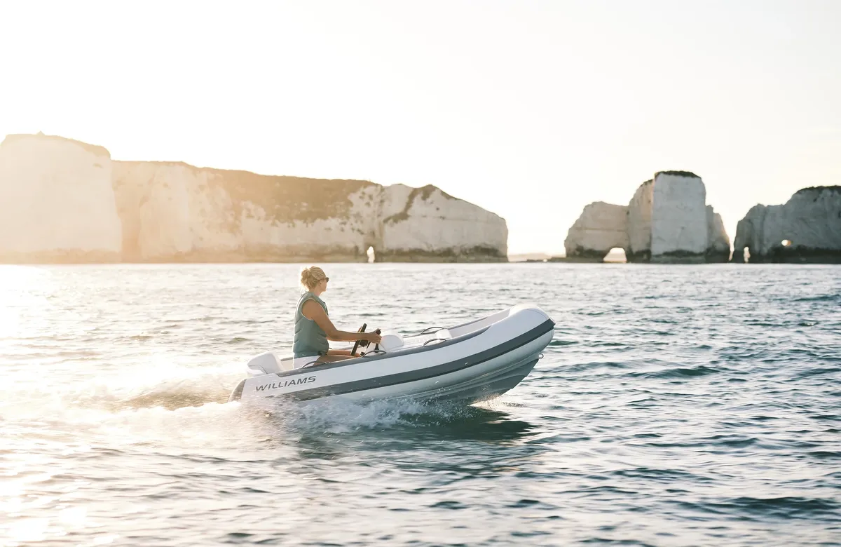 Williams Jet Tenders TurboJet 280MX: Boat cruising past white cliffs